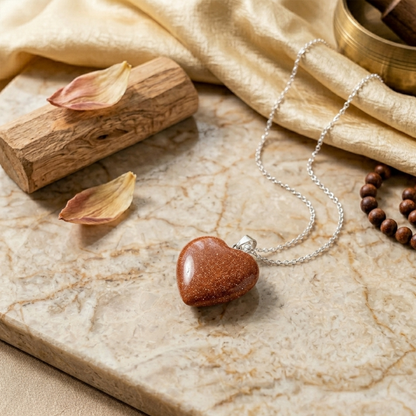 Sun stone heart pendent